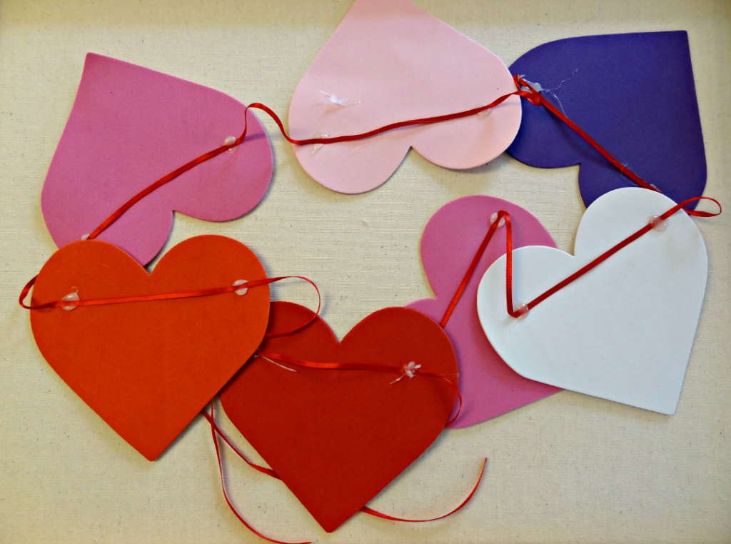 Easy Valentine's Day Craft Idea - Make a simple Valentine's Day Garland with foam hearts & ribbon!