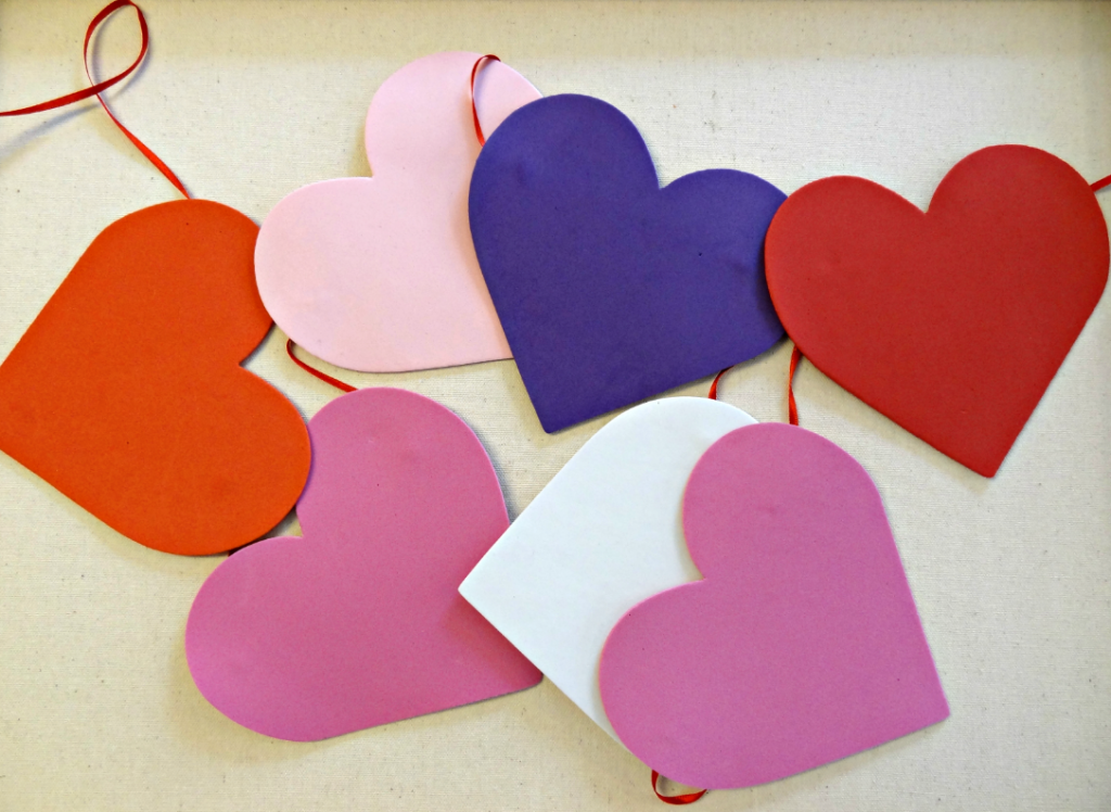 Easy Valentine's Day Craft Idea - Make a simple Valentine's Day Garland with foam hearts & ribbon!