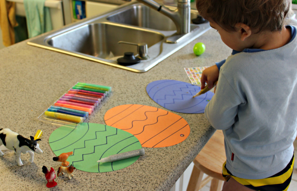 Sticker Eggs are a fun and easy Easter craft that your toddlers and preschoolers will love. Ready in just 5 minutes and easy clean-up. Perfect for a quick craft project! #Easter #Eastercrafts #easteregg #toddlercrafts #finemotorskills #stickers #preschool #preschoolcrafts