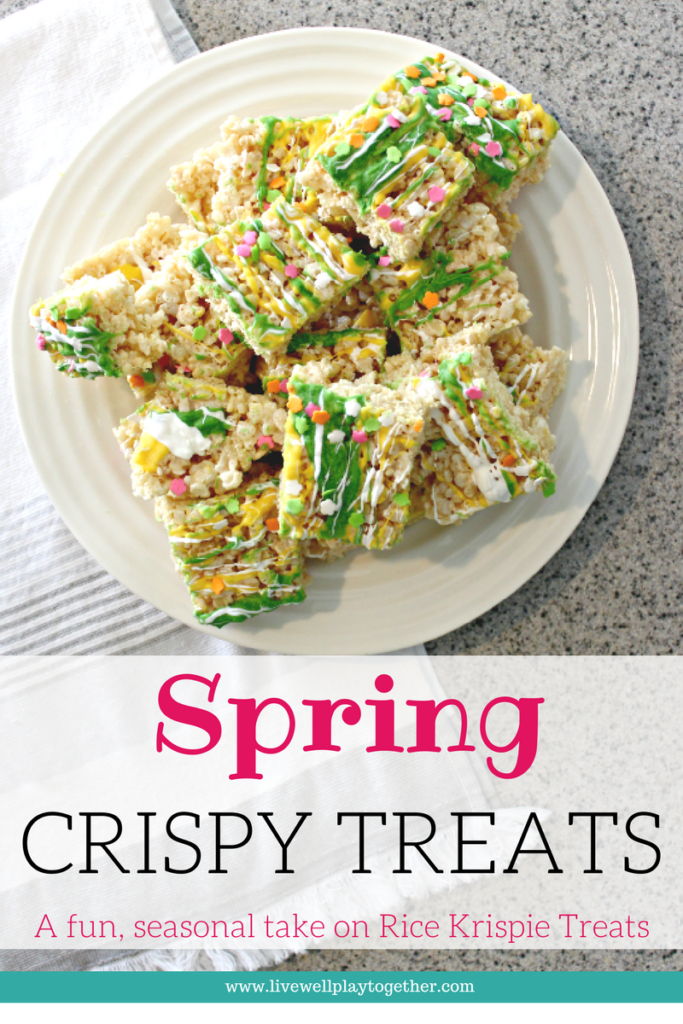 Spring Rice Krispies Treats - A fun way to celebrate spring and get your kids in the kitchen cooking with you! #spring #springsnacks #kidsnacks #cookingwithkids #ricekrispiestreats #crispytreats #easter #eastersnacks #easypartyfood