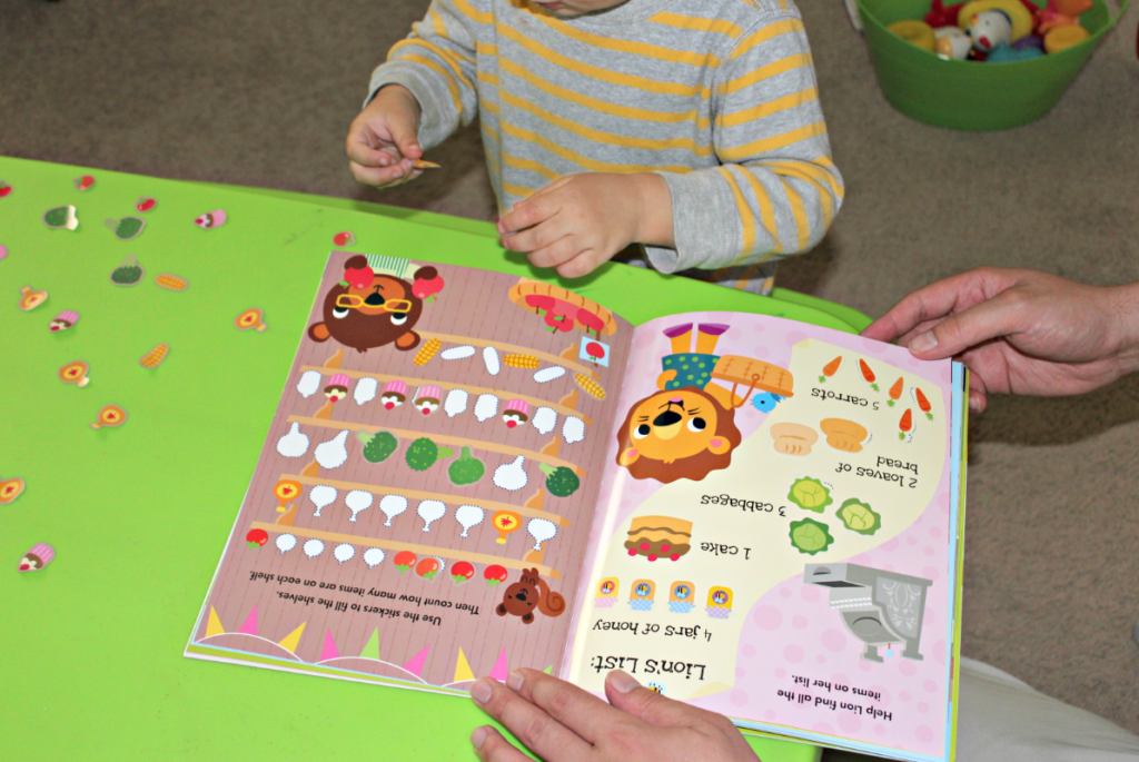 Using sticker books for fine motor skills. Fine Motor Activities for Toddlers and Preschoolers from livewellplaytogether.com