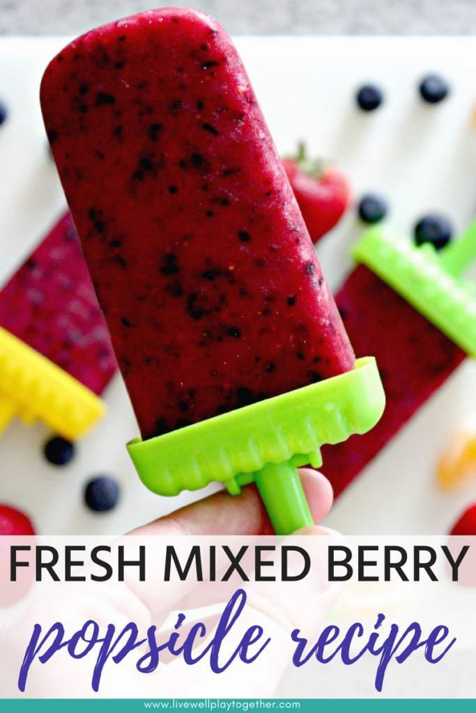 Homemade Strawberry-Blueberry Popsicles from Live Well Play Together. These homemade mixed berry pops are the perfect treat to cool off during the summer. Quick, healthy, and kid-friendly! #popsicles #frozenpops #icepops #healthysnacks #summersnacks #summerfood #strawberries #blueberries #kidfriendlyrecipes