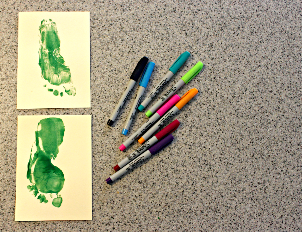 Footprint Christmas Tree Crafts for Kids - Perfect for Homemade Christmas cards for DIY Christmas Decorations for Kids.  Great idea for Baby's First Christmas Footprints! Plus a really fun way to capture their little footprints for the holidays!  #christmascrafts #christmaswithkids #christmascraftsforkids #toddlercrafts #babyfootprintcrafts #babysfirstchristmas