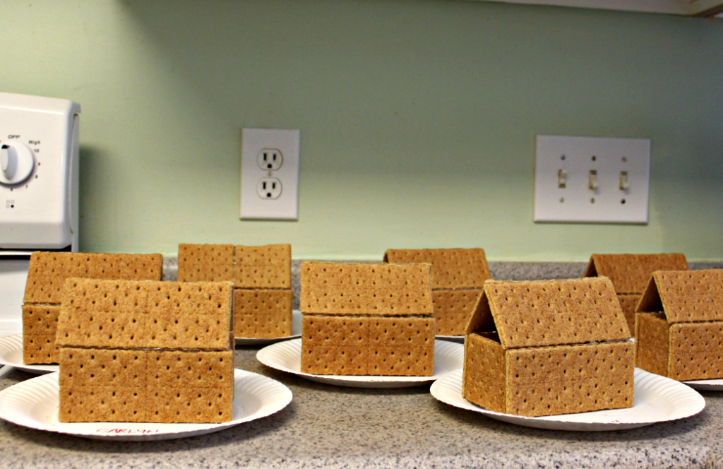 Graham Cracker Gingerbread Houses on paper plates