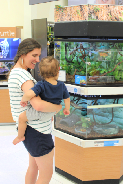 Mother with toddler at a pet store