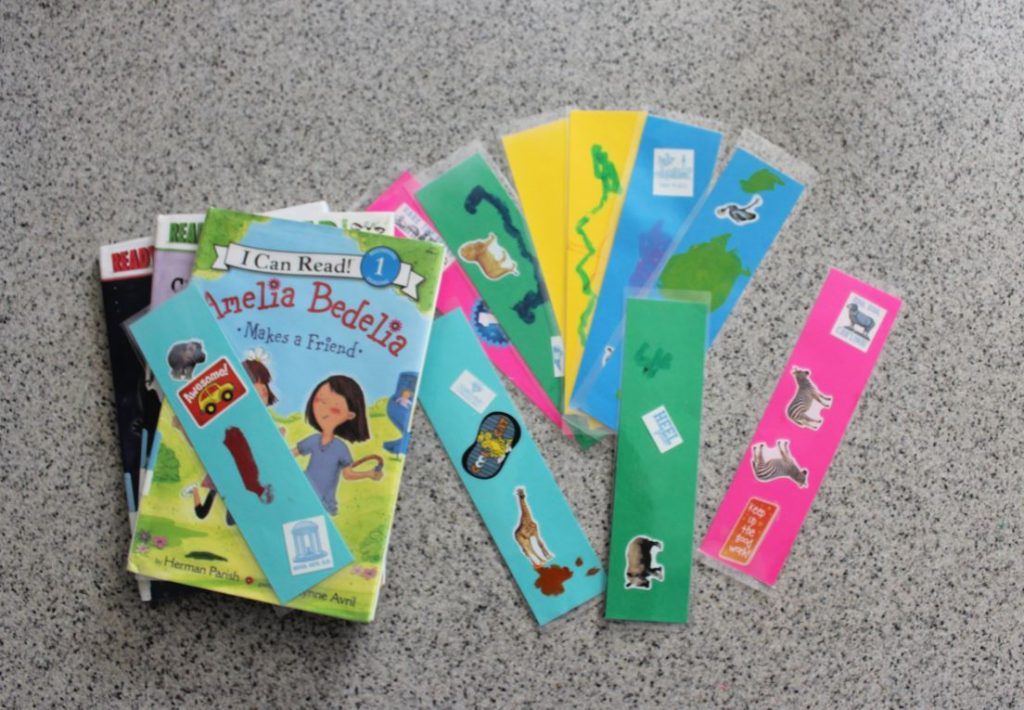 stack of early reader books and DIY bookmarks - How to make your own bookmarks - a fun activity for kids to celebrate National Reading Month