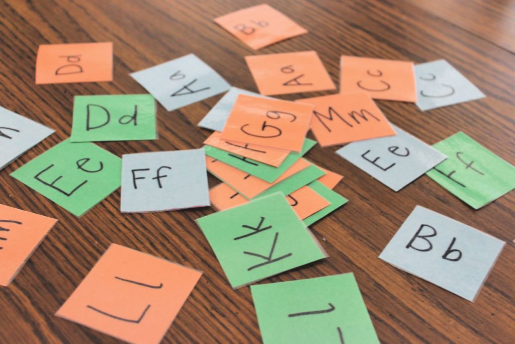 ABC flashcards scattered on a table