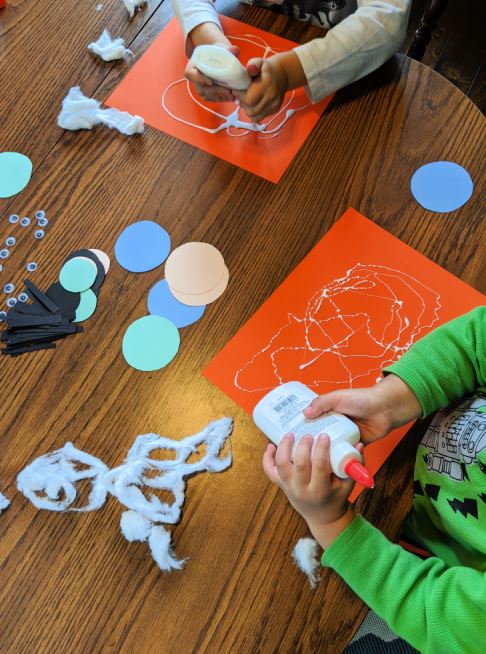 Cotton ball spider webs! A fun spider craft for kids!