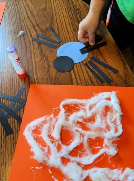 How to make a cotton ball spider web with kids - a fun spider craft for preschoolers
